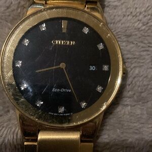Citizen Gold-Tone Eco-Drive Watch with Black Dial